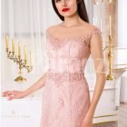 Women’s soft light pink mermaid style rich satin gown with same hue appliqués