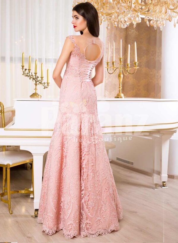Women’s soft light pink mermaid style rich satin gown with same hue appliqués bAack side view