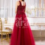 Women’s soft maroon floor length tulle skirt gown with rich rhinestone bodice back side view