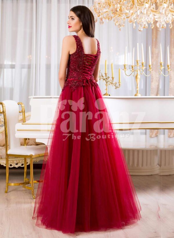 Women’s soft maroon floor length tulle skirt gown with rich rhinestone bodice back side view