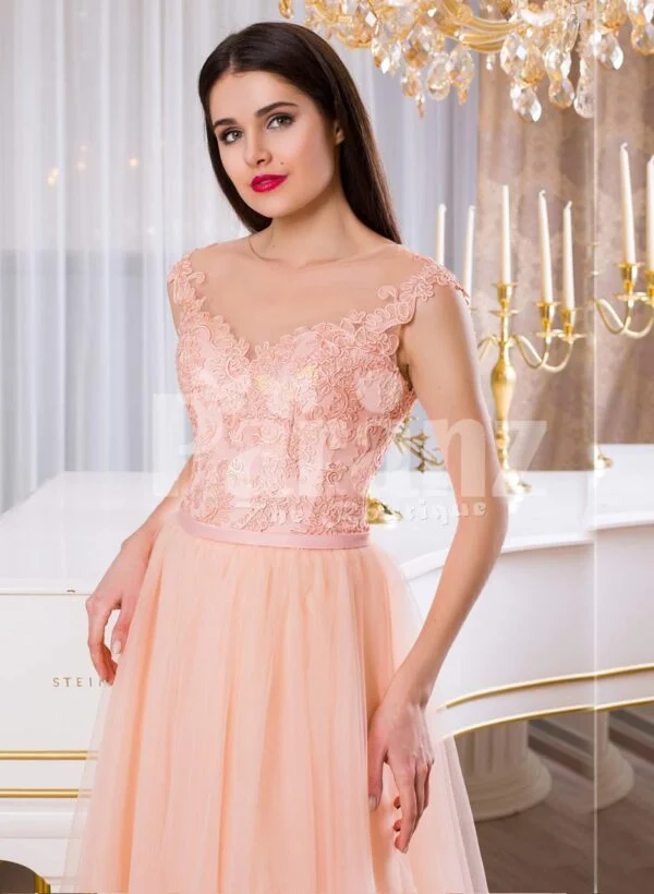 Women’s soft peach long tulle skirt evening gown with threaded appliquéd bodice