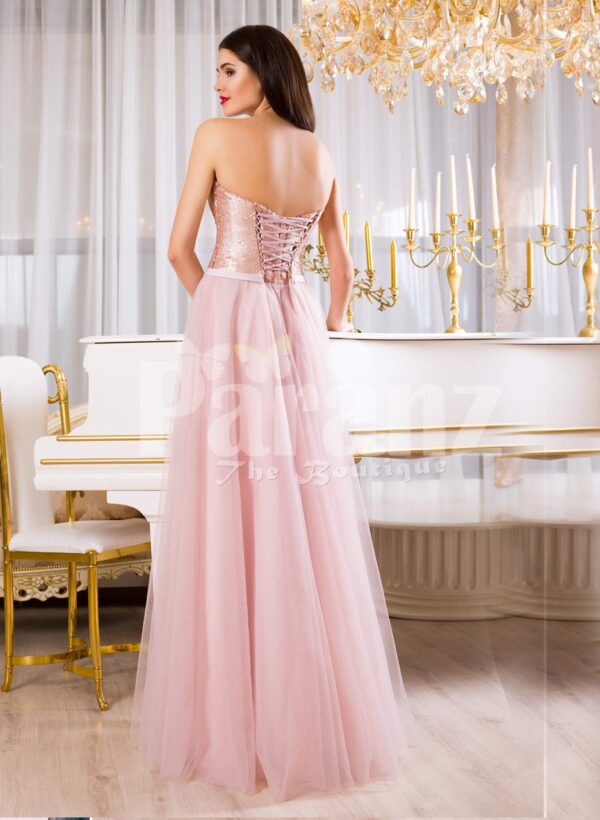Women’s super glam evening gown with silver sequin bodice with pink tulle skirt back side view