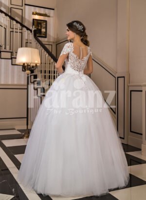 Women’s super glam exclusive flared and high volume wedding tulle gown in white back side view