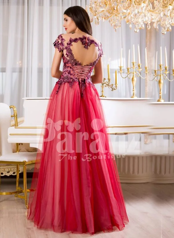 Women’s super glam floor length tulle skirt evening gown with floral appliquéd bodice back side view