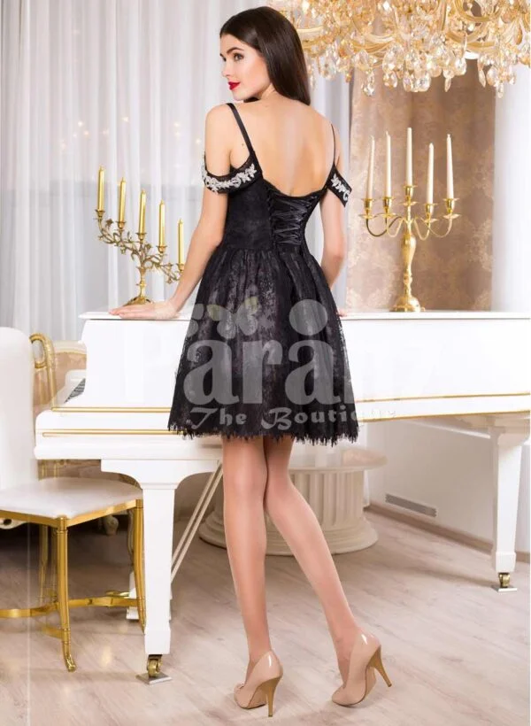 Women’s super glam glossy black rich satin small gown with white pearl decorations back side view