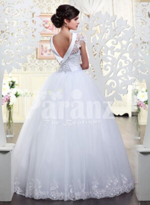 Women’s super lacy royal bodice wedding gown with high volume flared white tulle skirt Back side view