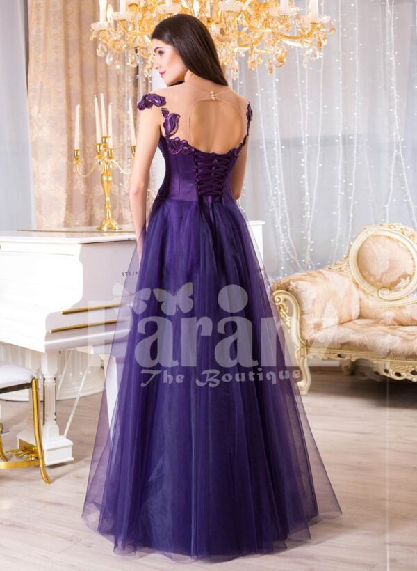 Women’s super soft and sooth floor length tulle skirt gown with purple flower appliqués back side view