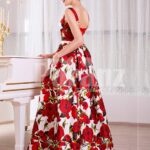 Women’s super stylish and fancy rich satin long gown with red rosette prints all over side view