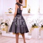 Women’s tea length rich satin-sheer evening party dress with white lace appliquéd bodice back side view