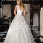 Women’s truly beautiful satin-tulle pearl white glitz wedding gown back side view