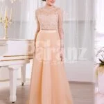 Women’s truly glam evening gown with long peachy orange tulle skirt and satin bodice