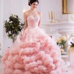 Women’s unique elegant evening gown with long tulle skirt with ruffle cloud hem in pink