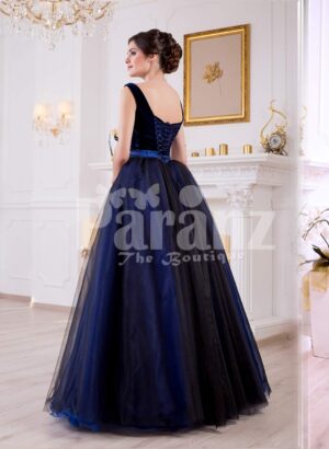 Women’s velvet bodice glam evening gown with flared and high volume satin-tulle skirt back side view