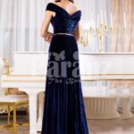 Women’s velvet navy floor length evening gown with elegant off-shoulder bodice back side view