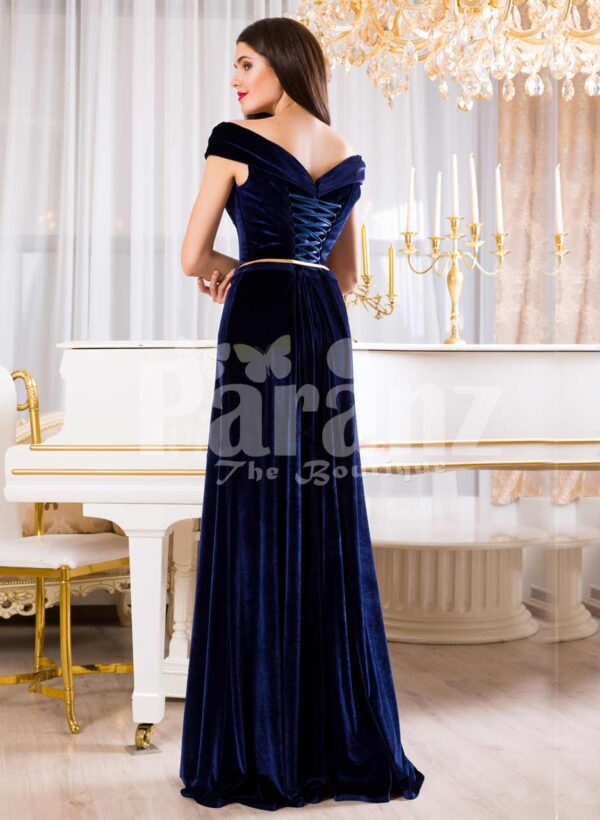 Women’s velvet navy floor length evening gown with elegant off-shoulder bodice back side view