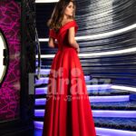 Women’s vibrant red off-shoulder rich satin gown with floor length side slit skirt back side view