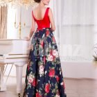 Women’s vibrant red satin bodice evening gown with floral printed rich satin skirt side view