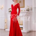 Women’s vibrant red side slit full sleeve glam evening gown with all over lace work