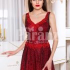Women’s vibrant red sleeveless evening gown with floor length skirt