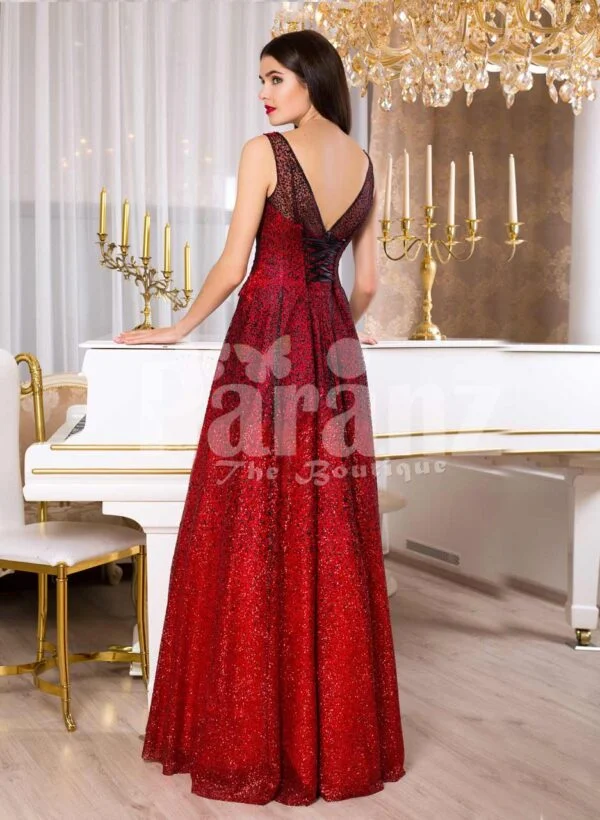 Women’s vibrant red sleeveless evening gown with floor length skirt back side view