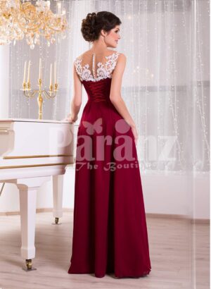 Women’s white lace appliquéd bodice glam evening gown with long maroon skirt back side view