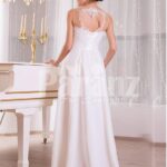 Elegant pearl white sleeveless evening gown with long tulle skirt and lace appliquéd bodice back side view