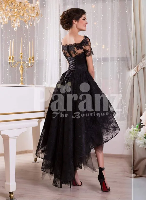 Women’s glam black high-low rich satin evening gown with delicate lace work side view