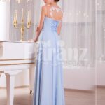Women’s light blue sleek tulle skirt floor length gown with white floral appliquéd bodice side view
