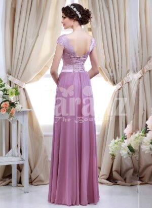 Women’s light metal pink bodice evening gown with rich mauve long tulle skirt back side view