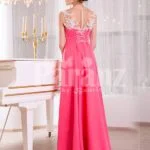 Women’s pink evening gown with white floral appliquéd bodice and sleek tulle skirt back side view