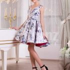 Women’s sleeveless blue floral print rich satin small evening gown with delicate lace work