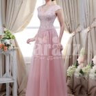Women’s small cap sleeve royal bodice evening gown with light pink long tulle skirt