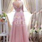 Women’s small cap sleeve royal bodice evening gown with light pink long tulle skirt side view