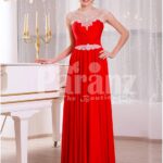 Women’s vibrant red sleeveless evening gown with sleek and long floor length tulle skirt