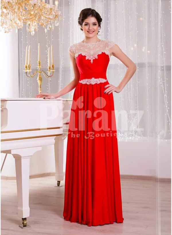 Women’s vibrant red sleeveless evening gown with sleek and long floor length tulle skirt