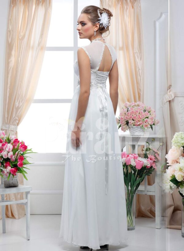 Women’s white floor length royal evening party gown with rich rhinestone work neckline side view