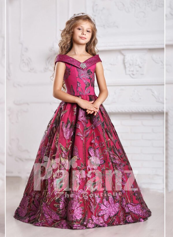 A long and formal cherry dress with elaborate designing for little girls