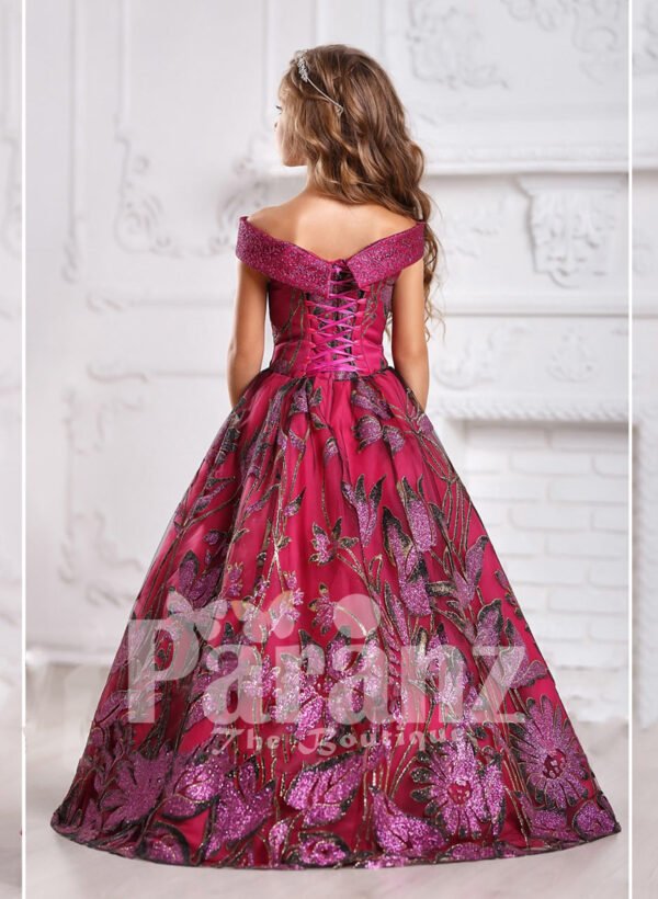 A long and formal cherry dress with elaborate designing for little girls back side view