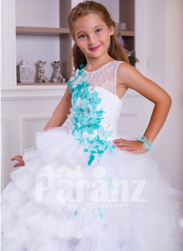 A long formal dress for little girls in white & coral green