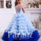 A majestic long formal dress for little girls in blue back side view