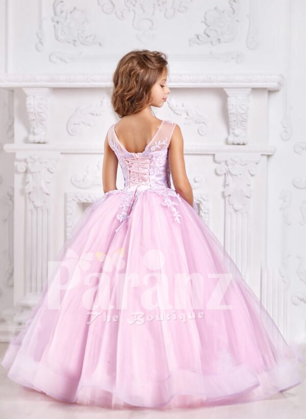 A plush and feminine formal pink dress for little girls back side view