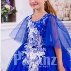 A superbly designed long formal dress for little girls in striking blue side view