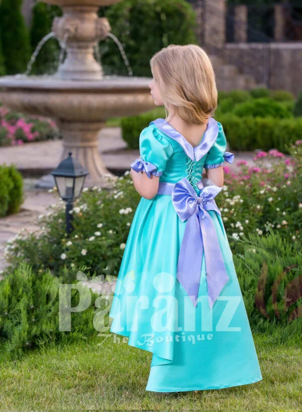 A touch of royalty for your little princess with this exotic blue formal dress side view