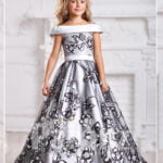 Magnificence redefined with this long formal dress for little girls