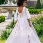 The white dress for little bridesmaids and other formal gatherings back side view